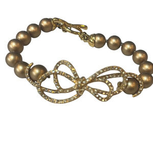 Gold Pearl Bead Bracelet with Delicate Rhinestone Bow and Toggle Clasp